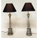 COLUMN TABLE LAMPS, a pair, silvered metal with graduated fluted columns and Corinthian capping with