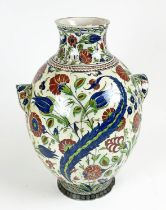 A LARGE IZNIK STYLE POTTERY VASE, Italian 19th century with under glaze saz leaf decorations and