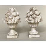 GARDEN FINIALS, a pair, weathered reconstituted stone modelled as cornucopia/fruit, 50cm H. (2)