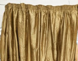 CURTAINS, a set of six, in gold silk with cream lining, comprising one pair with a gathered length