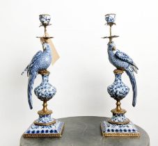 CANDELABRA, a pair, 48cm H, in the form of birds, blue and white ceramic, gilt metal mounts. (2)