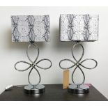 TABLE LAMPS, a pair, polished metal abstract design each 53cm H including shades. (2)