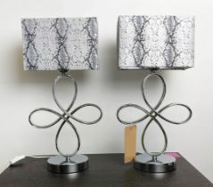 TABLE LAMPS, a pair, polished metal abstract design each 53cm H including shades. (2)