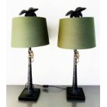 TABLE LAMPS, a pair, 84cm high x 36cm diameter, green shades, palm tree bases with a climbing monkey