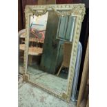 WALL MIRROR, Regency style, swag decoration to frame, fitted with bevelled edge glass, 143cm H x