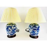 TABLE LAMPS, a pair, 54cm H x 38cm diam., Export style, Chinese blue and white ceramic, with shades.