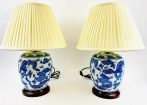 TABLE LAMPS, a pair, 54cm H x 38cm diam., Export style, Chinese blue and white ceramic, with shades.