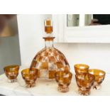 DECANTER AND GLASSES, Art Deco Bohemian decanter and six glasses with amber overlaid glass detail