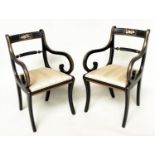 ARMCHAIRS, a pair, Regency style lacquered and gilt lined with music trophy centre and scroll