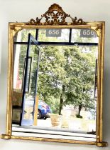 OVERMANTEL MIRROR, 19th century carved giltwood arched rectangular with shell and scroll crest and