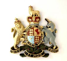 ARMORIAL WALL RELIEF PLAQUE, polychrome finished resin, 75cm x 70cm x 6cm.