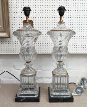 TABLE LAMPS, 57cm high, 18cm diameter, a pair, glass urn form, stone bases. (2)