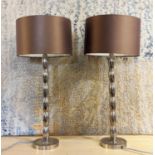 TABLE LAMPS, a pair, polished metal, with shades, 65cm H. (2)