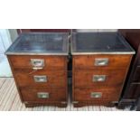 MILITARY STYLE CHESTS, a pair, each 41cm W x 37cm D x 58cm H, with leather tops and brass recessed