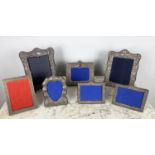 COLLECTION OF SILVER PICTURE FRAMES, six embossed including an RBB makers mark frame, London 1986, a