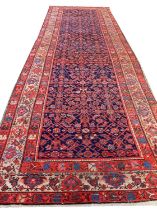 ANTIQUE NORTH WEST PERSIAN CORRIDOR CARPET, 500cm x 155cm.