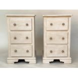 BEDSIDE CHESTS, a pair, traditionally grey painted each with three drawers and bracket supports,