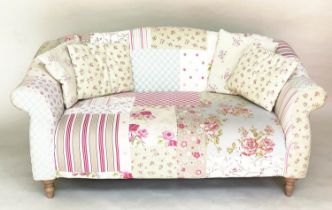 SOFA BY CATH KIDSTON, two seater Victorian style patchwork with scroll arms and turned supports (