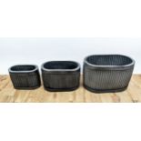 PLANTERS, a graduated set of three, galvanised metal, 57cm x 33cm x 36cm. (3)