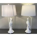 TABLE LAMPS, a pair, in the form of cockatoos, with shades, 76cm x 38cm x 38cm.