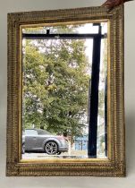 WALL MIRROR, Italian style giltwood with beveled mirror and cushion frame, 114cm H x 83cm W .