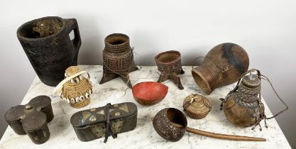 A COLLECTION OF EAST AFRICAN AND TRIBAL ITEMS, a handmade coconut shell ladle, Ethiopian woven fiber