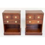 CAMPAIGN STYLE CHESTS, a pair, yewwood and brass bound each with tooled leather brushing slide and