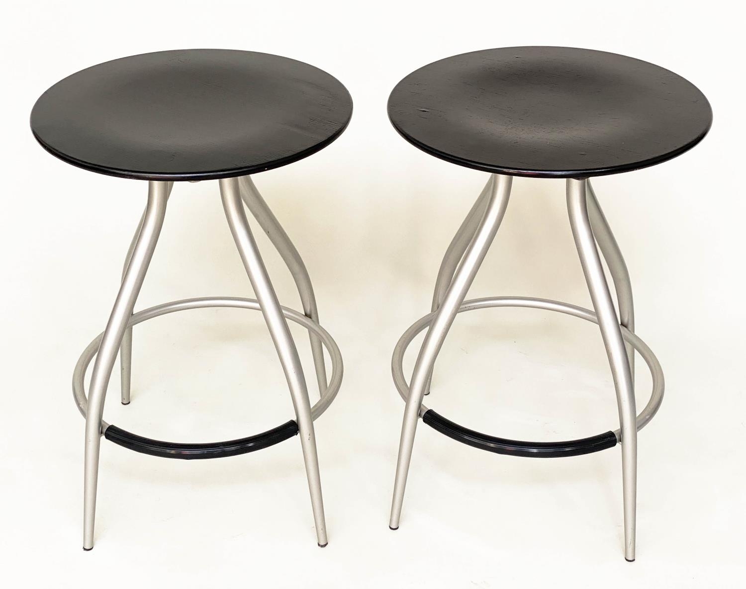 CALLIGARIS BAR STOOLS, a pair, 60cm x 41cm diam., circular ash seat and metal framed, with footrest.