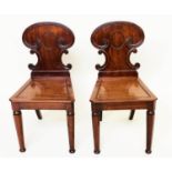HALL CHAIRS, a pair, 19th century William IV mahogany, each with scroll carved back and facetted