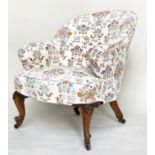 SLIPPER ARMCHAIR, early 20th century mahogany with curved back and arms and 'tapestry' print loose