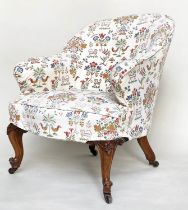 SLIPPER ARMCHAIR, early 20th century mahogany with curved back and arms and 'tapestry' print loose