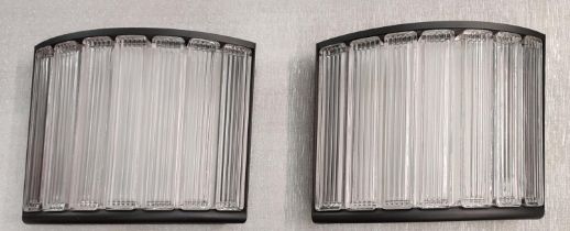 SANTA AND COLE ESTADIO WALL LAMPS, a pair, by Miguel Mica, 44cm x 33cm x 15cm. (2)