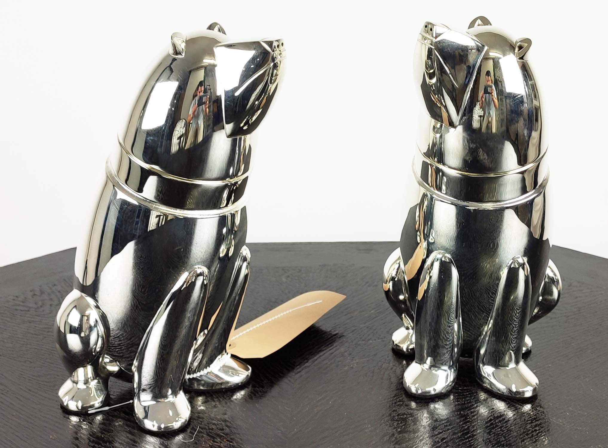 COCKTAIL SHAKERS, a pair, in the form of polar bears, polished metal, 27cm H. (2)