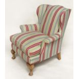 WINGBACK ARMCHAIR, early 20th century with ticking style upholstery, 82cm W.
