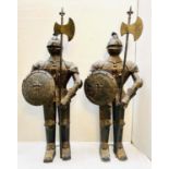 FAUX SUITS OF ARMOUR, a pair, 140cm high, 55cm diameter, antiqued finish. (2)