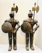 FAUX SUITS OF ARMOUR, a pair, 140cm high, 55cm diameter, antiqued finish. (2)