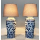 TABLE LAMPS, a pairs, Chinese blue and white ceramic of lidded vase form, with shades, 75cm H. (2)