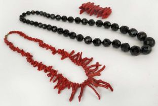 A WHITBY JET SINGLE STRAND NECKLACE, fitted with 42 graduated faceted beads, 74cm long; together