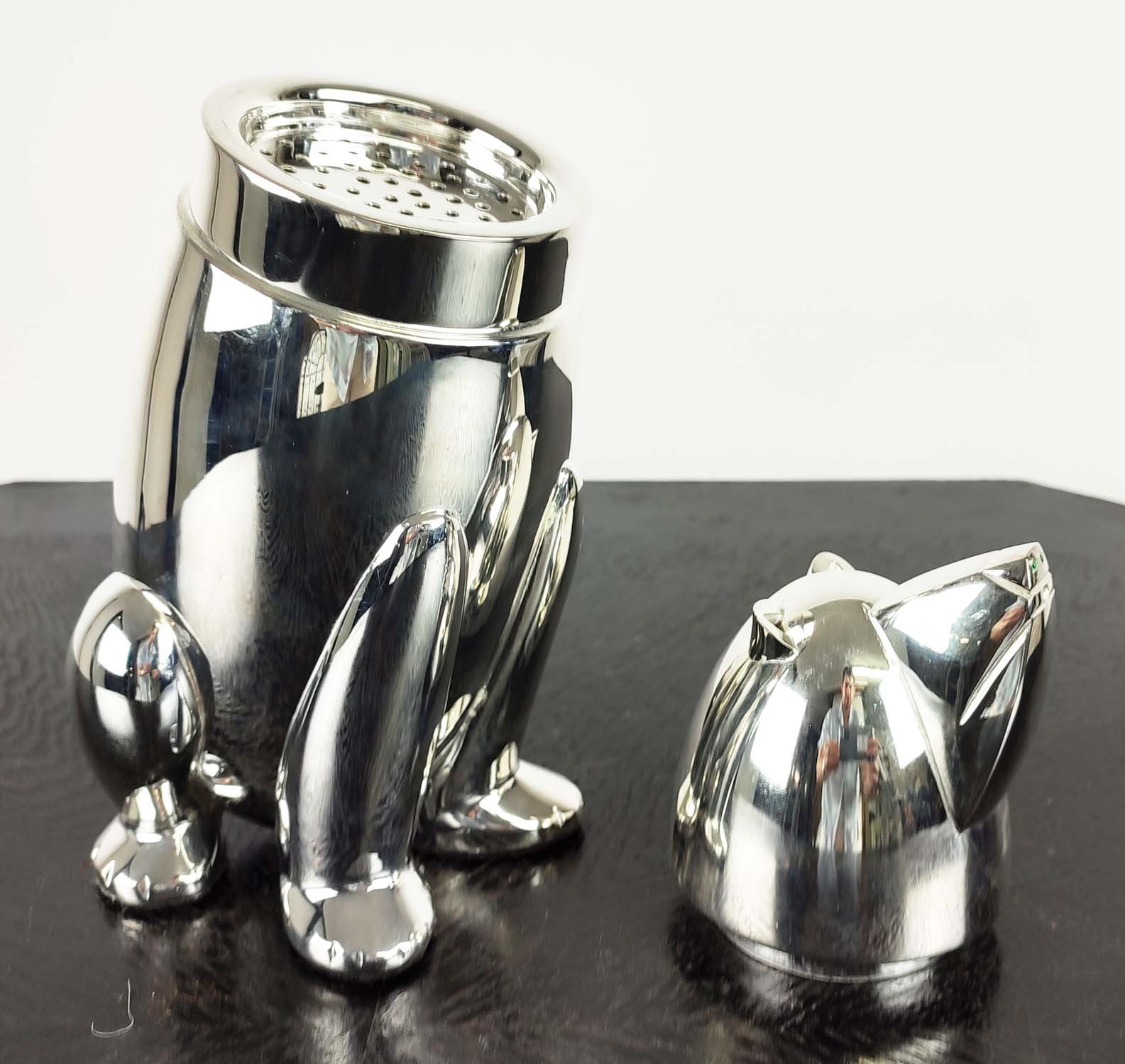 COCKTAIL SHAKERS, a pair, in the form of polar bears, polished metal, 27cm H. (2) - Image 2 of 5