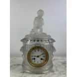 BACCARAT MANTLE CLOCK, late 19th century etched and frosted glass, with putto seated figural top,