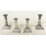 CANDLESTICKS, a pair, Edward VII silver with square reeded bases Chester 1910, together with a