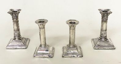 CANDLESTICKS, a pair, Edward VII silver with square reeded bases Chester 1910, together with a