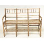 FAUX BAMBOO HALL SEAT, 19th century English carved faux bamboo framed with down swept arms and