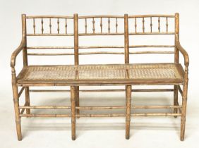 FAUX BAMBOO HALL SEAT, 19th century English carved faux bamboo framed with down swept arms and