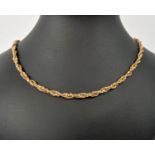 AN 18CT GOLD INTERTWINED ROPE AND DISK LINK NECKLACE, 70cm long, 32.96 grams.