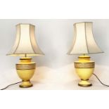 TABLE LAMPS, a pair, yellow ceramic of urn form with Italian script and pagoda silk shades, 67cm