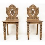 HALL CHAIRS, a pair, 19th century Gothic oak each with carved and pierced lion mask backs, 43cm