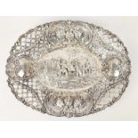 ROCOCO REVIVAL OVAL BASKET, white metal probably Dutch, embossed decoration throughout, 35cm x 27cm,