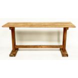 DINING TABLE, early 20th century pine rectangular planked with slab trestle supports of shallow
