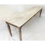 HARVEST TABLE, 19th century English pine, two plank top raised upon facetted and turned supports,